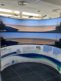 Photo du panneau d'informations du projet éolien en mer de Dunkerque